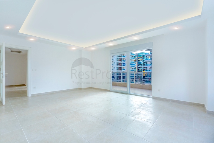 Квартира планировкой 2+1 в новом доме в Махмутларе