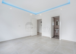 Квартира планировкой 2+1 в новом доме в Махмутларе