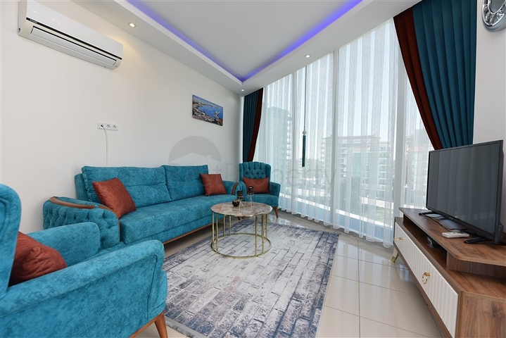 Просторная двухкомнатная квартира в Махмутларе