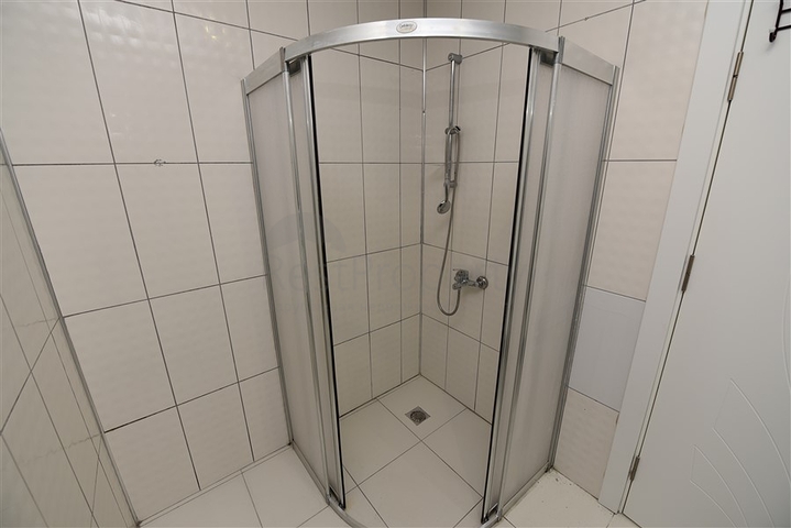 Просторная двухкомнатная квартира в Махмутларе