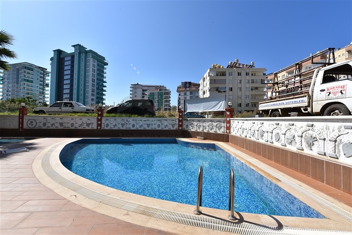 Просторная двухкомнатная квартира в Махмутларе