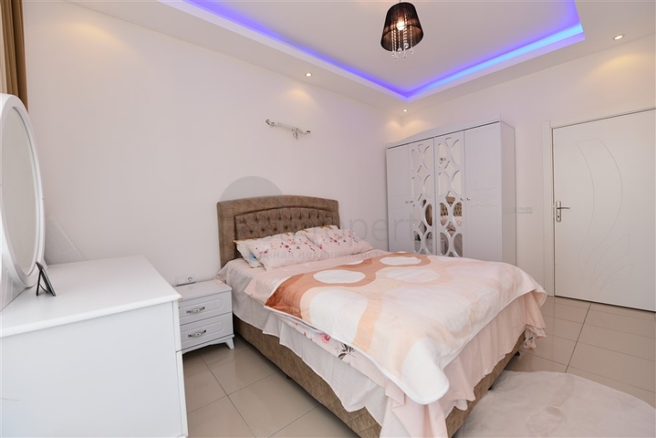 Просторная двухкомнатная квартира в Махмутларе