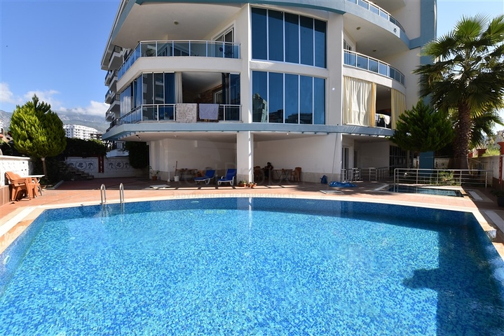 Просторная двухкомнатная квартира в Махмутларе