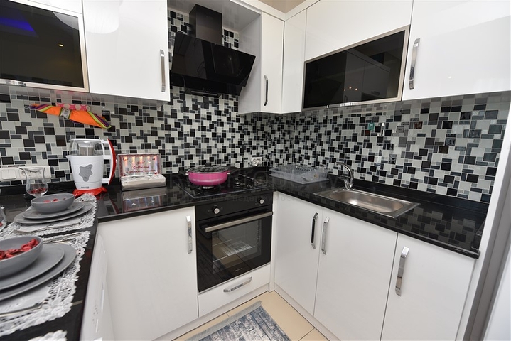 Просторная двухкомнатная квартира в Махмутларе