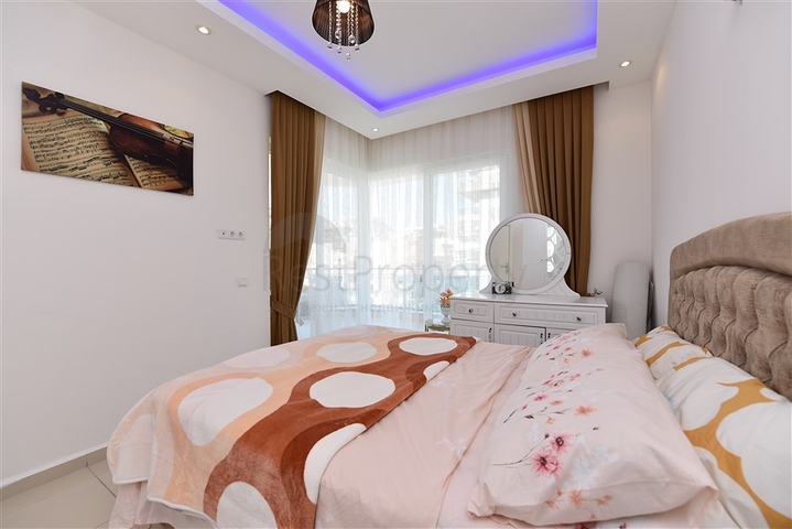 Просторная двухкомнатная квартира в Махмутларе