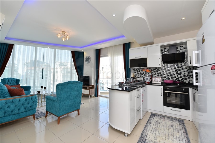 Просторная двухкомнатная квартира в Махмутларе