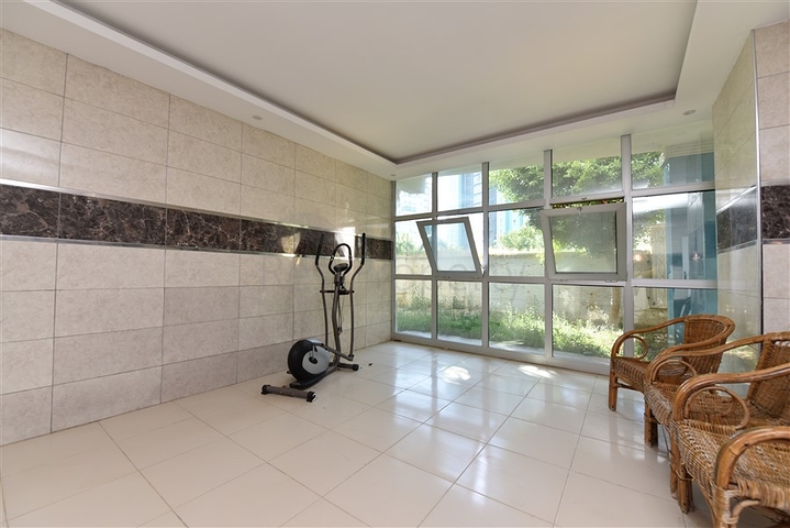 Просторная двухкомнатная квартира в Махмутларе