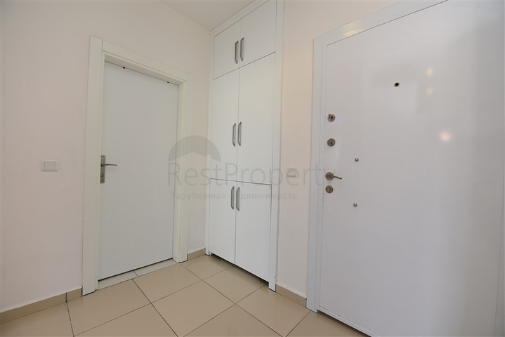 Просторная двухкомнатная квартира в Махмутларе