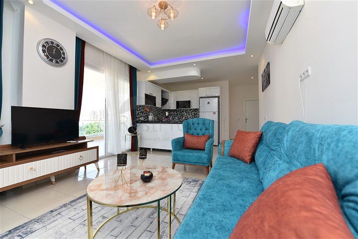 Просторная двухкомнатная квартира в Махмутларе