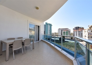 Просторная двухкомнатная квартира в Махмутларе