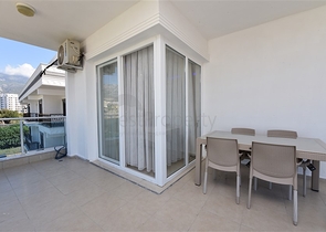 Просторная двухкомнатная квартира в Махмутларе