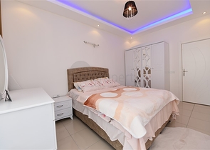 Просторная двухкомнатная квартира в Махмутларе