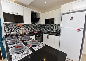 Просторная двухкомнатная квартира в Махмутларе