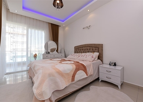 Просторная двухкомнатная квартира в Махмутларе