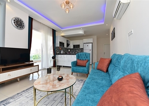 Просторная двухкомнатная квартира в Махмутларе