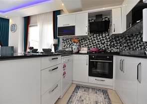 Просторная двухкомнатная квартира в Махмутларе