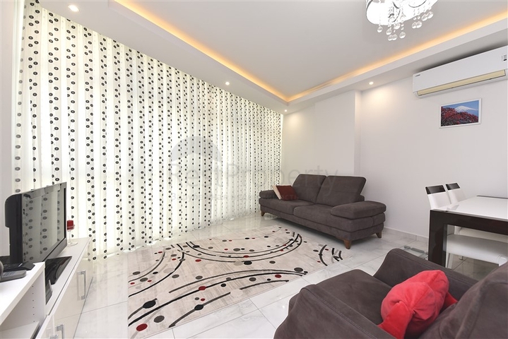 Двухкомнатная квартира в центре Махмутлара 