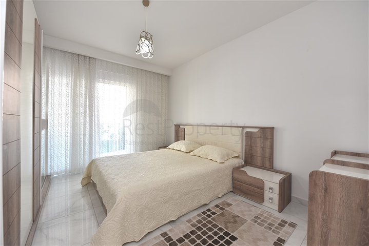 Двухкомнатная квартира в центре Махмутлара 