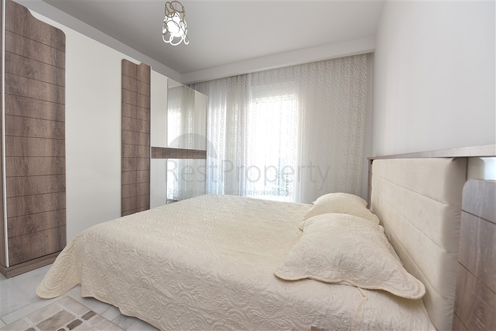 Двухкомнатная квартира в центре Махмутлара 