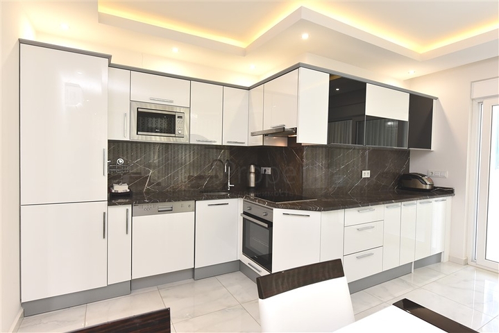 Двухкомнатная квартира в центре Махмутлара 