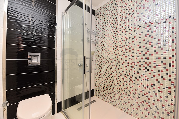 Двухкомнатная квартира в центре Махмутлара 