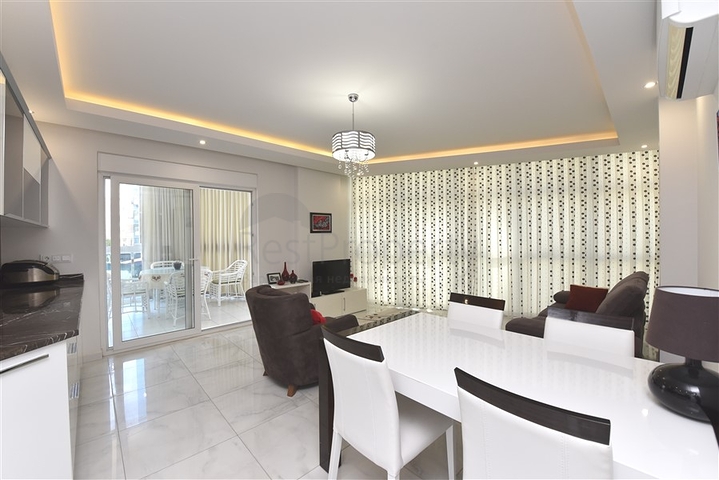 Двухкомнатная квартира в центре Махмутлара 