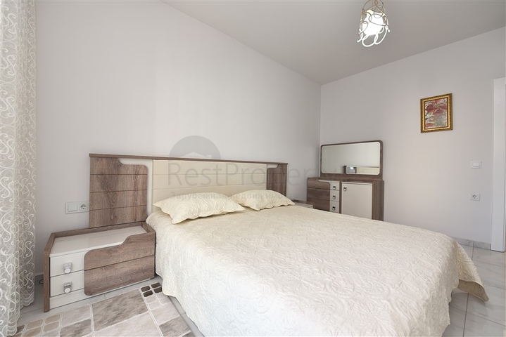 Двухкомнатная квартира в центре Махмутлара 