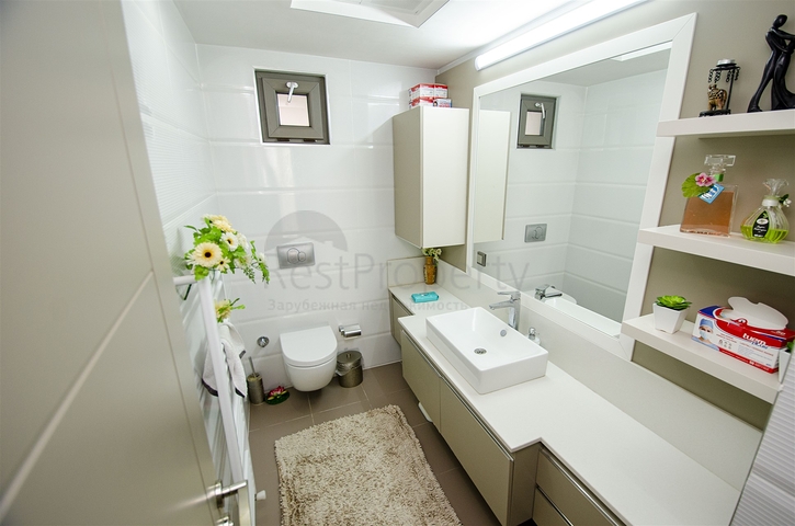 Элитная квартира 5+1 с выходом в сад в Унжалы Коньяалты