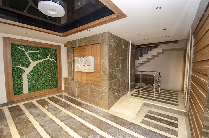 Элитная квартира 5+1 с выходом в сад в Унжалы Коньяалты