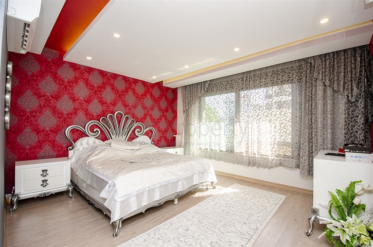 Элитная квартира 5+1 с выходом в сад в Унжалы Коньяалты