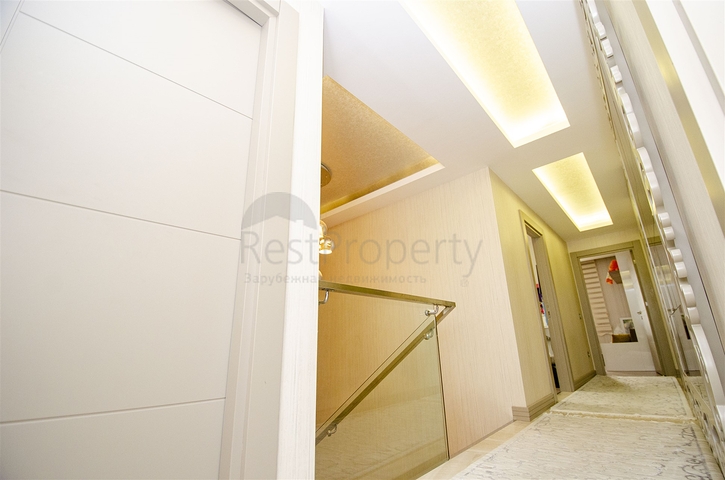 Элитная квартира 5+1 с выходом в сад в Унжалы Коньяалты