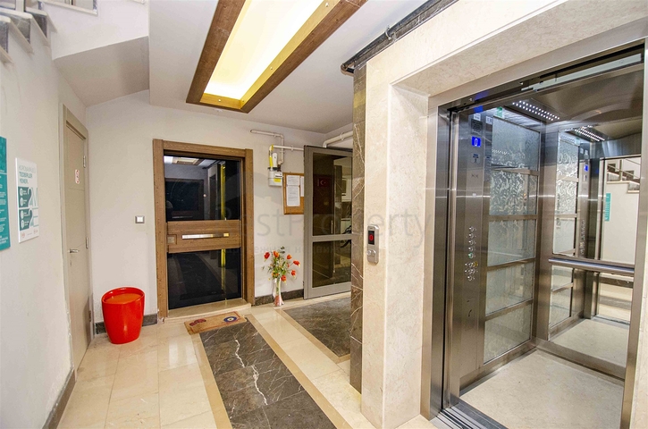 Элитная квартира 5+1 с выходом в сад в Унжалы Коньяалты