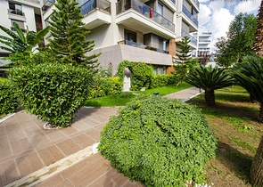 Элитная квартира 5+1 с выходом в сад в Унжалы Коньяалты