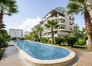 Элитная квартира 5+1 с выходом в сад в Унжалы Коньяалты