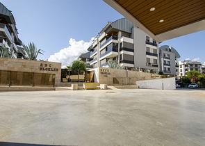 Элитная квартира 5+1 с выходом в сад в Унжалы Коньяалты