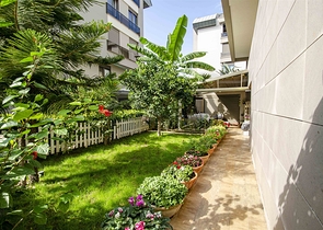 Элитная квартира 5+1 с выходом в сад в Унжалы Коньяалты