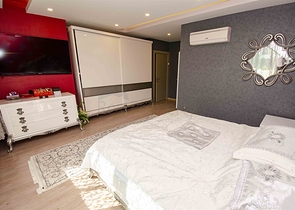 Элитная квартира 5+1 с выходом в сад в Унжалы Коньяалты