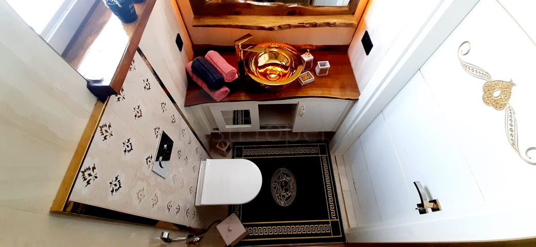 Апартаменты на первой береговой линии в районе Махмутлар 