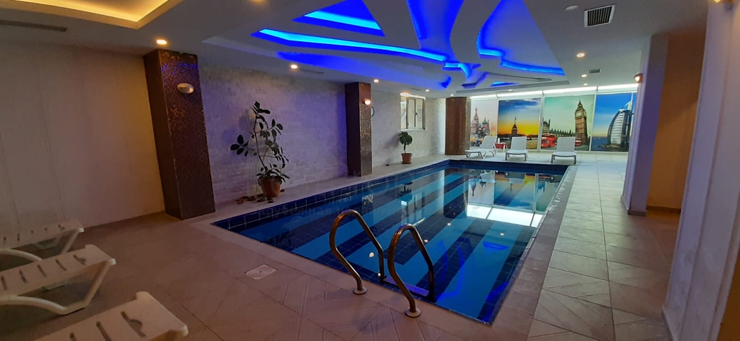 Апартаменты на первой береговой линии в районе Махмутлар 