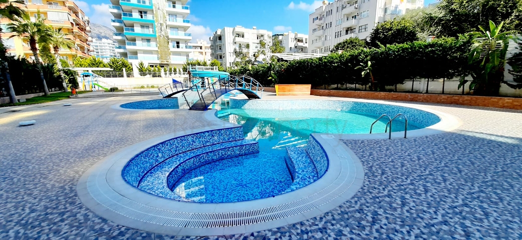 Апартаменты на первой береговой линии в районе Махмутлар 