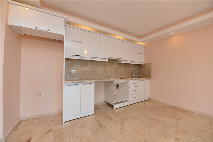 Две квартиры 2+1 на первой береговой линии в Махмутларе