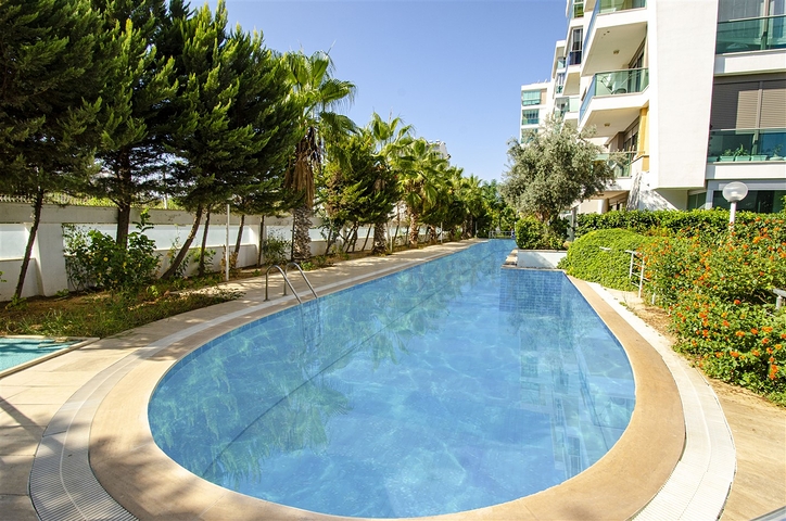 Меблированная квартира 2+1 с видом на море в Гюзельоба Лара 