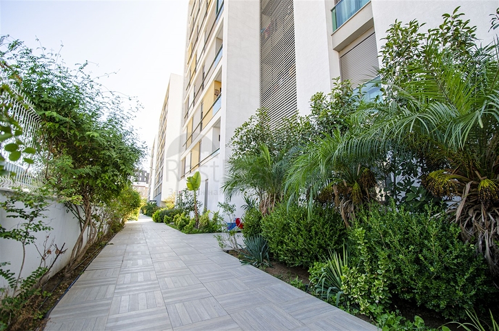 Меблированная квартира 2+1 с видом на море в Гюзельоба Лара 