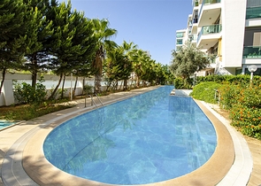 Меблированная квартира 2+1 с видом на море в Гюзельоба Лара 