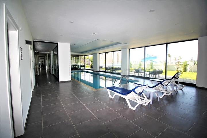 Двухкомнатная квартира в Махмутларе по выгодной цене