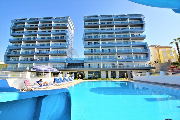 Двухкомнатная квартира в Махмутларе по выгодной цене