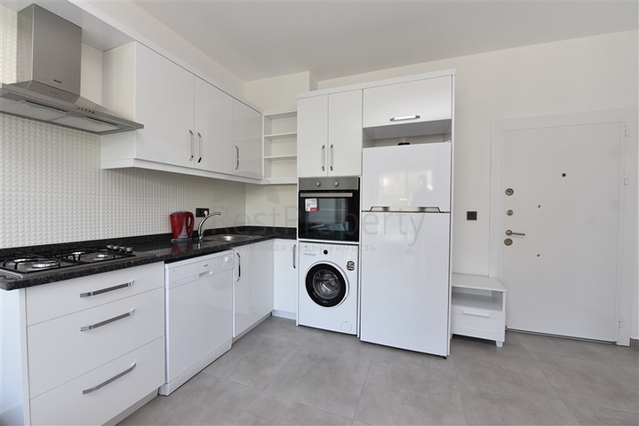 Двухкомнатная квартира в Махмутларе по выгодной цене