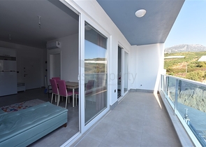 Двухкомнатная квартира в Махмутларе по выгодной цене