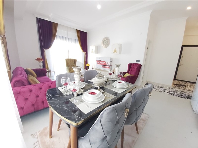 Двухкомнатная абсолютно новая квартира в Махмутларе