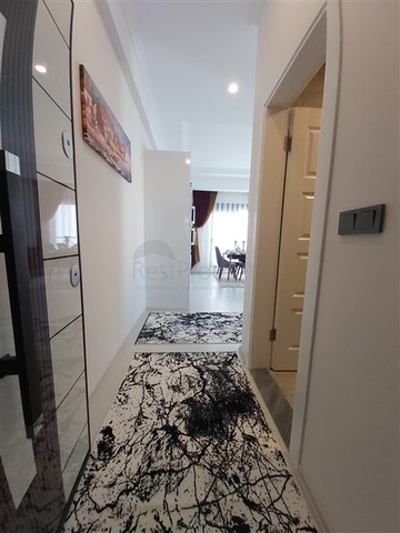 Двухкомнатная абсолютно новая квартира в Махмутларе